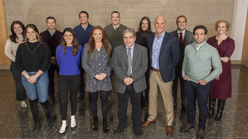Group picture of the Lurie Cancer Center Associate Board with director Leonidas Platanias