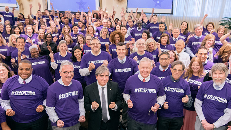 Group of Lurie Cancer Center faculty & staff wearing t-shirts that say Exceptional on them.