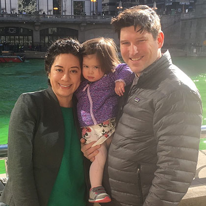 Monica Garcia Norlander with her husband and child