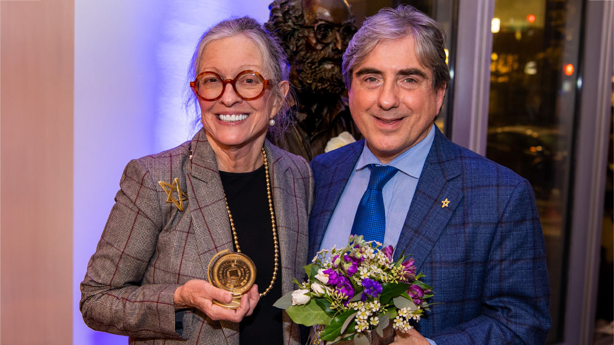 Ann Lurie with Dr Platanias at an awards gala