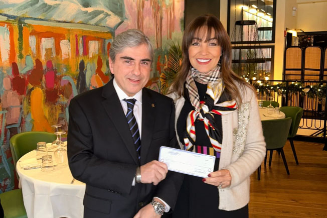 Leonidas Platanias and Eleni Bousis with fundraising check
