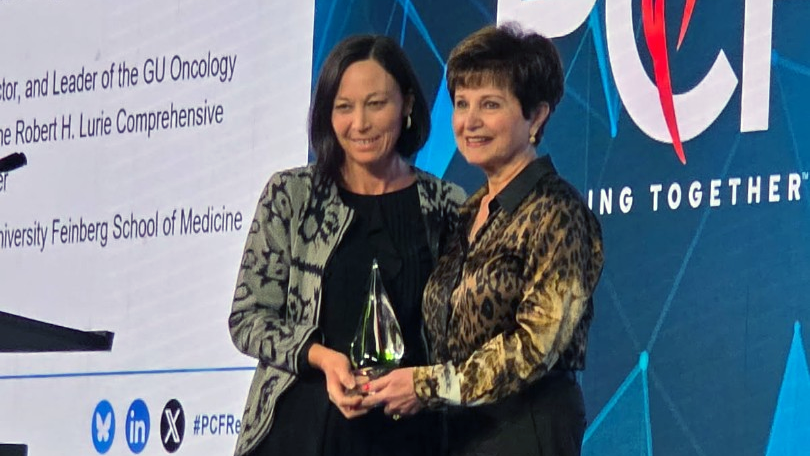 Maha Hussain accepting award in Carlsbad, California