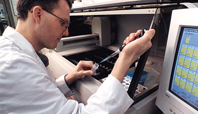 Researcher uses a pipette