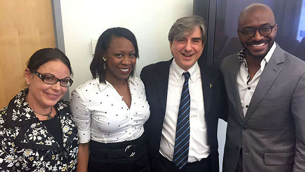 Melissa Simon, MD, Joi Evans, Leonidas Platanias, MD, PhD, and Pastor Chris Harris