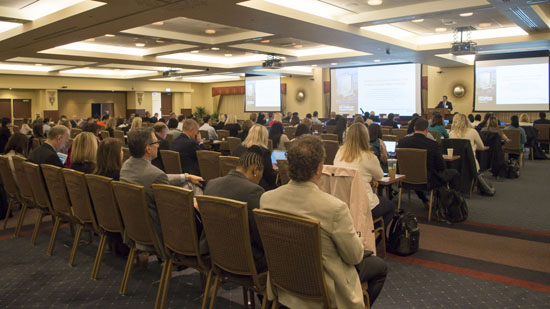 Participants attend the OncoSET symposium