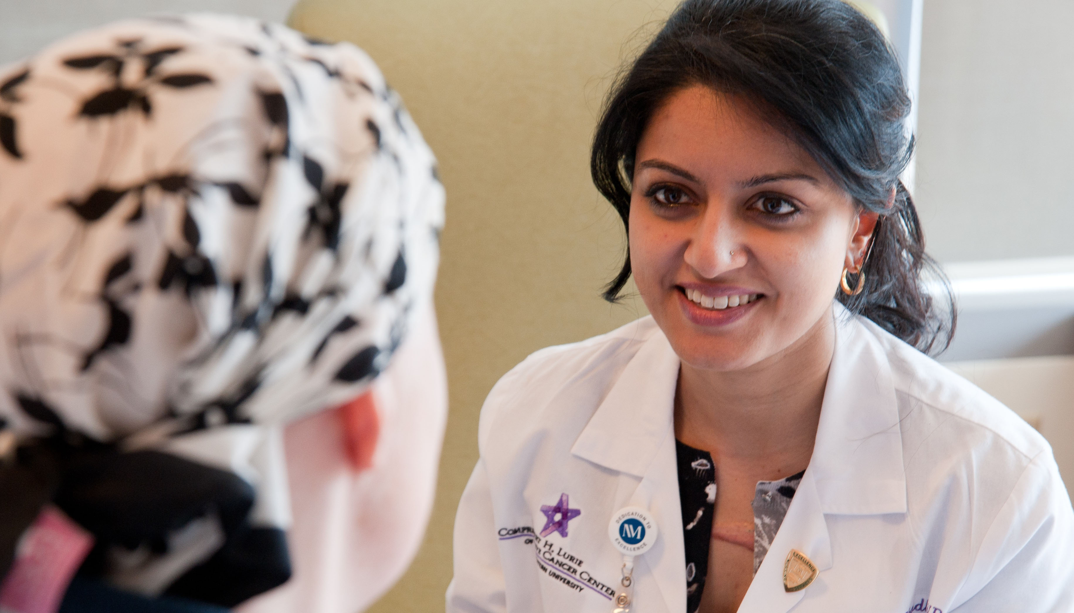 Healthcare professional talking to patient