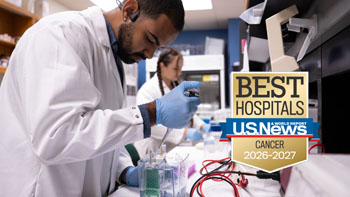 Photo of healthcare professionals with US News & World Report logo overlaid
