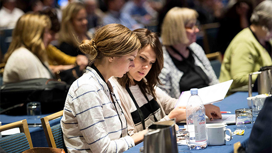 Participants at an educational event