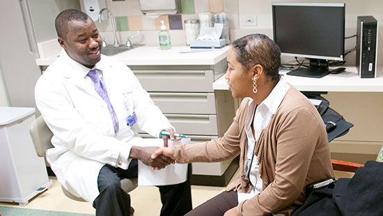 James Chandler, MD with patient